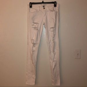 Ripped white skinny jeans